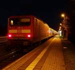 112 173-0 als Schublok des SH-Express 21074 nach Flensburg hier beim Halt in Schleswig. 06.01.2012