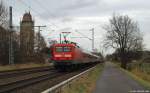 112 145-8 schiebt am 26.11.11 den SH-Express nach Flensburg durch Brokstedt.