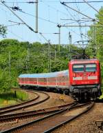 112 140-9 verlsst hier Schleswig Richtung Flensburg. Aufgenommen am Bahnbergang Karpfenteich in Schleswig. 28.05.12