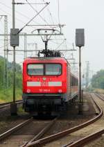 Nach dem Aufenthalt in Rostock wieder zurck ist die 112 146-6 die hier mit einer RB nach Flensburg den Bhf Jbek verlsst. 04.08.12