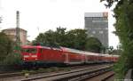 112 143-3 hat am 8.9.12 mit dem RE nach Hamburg Hbf. ihr Fahrtziel sogut wie erreicht und fhrt sogleich ber die Lombardsbrcke in den Hbf. ein.