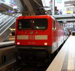112 124 stand am 15.3.13 mit einem Ersatzzug in Berlin Hbf. (tief)