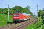 Mit dem RE 5 nach Neustrelitz rollt die 112 186 am 31.05.2013 durch Sildemow.