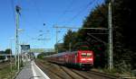 112 179-7 schob am 30.9.13 den RE nach Kiel Hbf. durch den Bf. Tornesch.