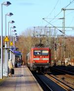 112 173-0 mit dem SHE nach Hamburg hat Einfahrt in Schleswig. 24.11.2013