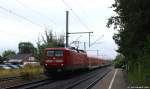 Mit dem RE 21424 nach Lübeck Hbf. durchfuhr 112 141-7 am 2.9.13 den Bf. von Bargteheide.