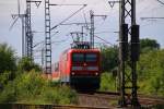 DB 6112 158-1 passiert hier mit einem SHE nach Hamburg Jübek am 06.06.2014