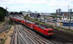 Mit dem RE 21027 nach Hamburg Hbf. verließ 112 154-0 am Nachmittag des 22.6.14 den Kieler Hbf. in Richtung Süden.