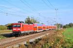 Die 112 146 ist am 17.09.2014 mit dem RE 4306 nach Hamburg unterwegs,hier in Sildemow.