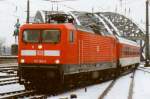 Am 13.Januar 1999 treft 112 180 mit Nachtzug-Garnitur in Köln Hbf ein.