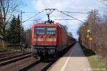 Den SH-Express schiebend durchfuhr 112 177-1 am 23.01.10 den Bhf. Prisdorf nach Norden.
