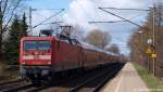 112 180-5 rauschte mit dem RE aus Kiel am 23.01.10 durch den Bhf. Prisdorf in Richtung Hamburg.