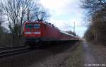 112 148-2 schob am 21.03.10 den RE nach Kiel Hbf. gleich durch den Bhf. Prisdorf in Richtung Norden.