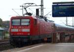 112 147-4 mit ihrem versptetem S-H Express fuhr whrend eines kleinen Schauers aus Schleswig ab. 28.8.10