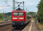 112 154-0 schiebt am 23.7.10 die Regiobahn nach Flensburg in den Bhf. Schleswig.