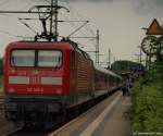 Am Zugende des RE nach Padborg (DK) hngt am 23.7.10 die 112 149-0 der Regio Bahn Kiel.