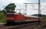 112 154-0 steht am 23.7.10 ein weiteres Mal im Schleswiger Bahnhof und wartet mit der Regio Bahn nach Neumnster auf Abfahrt.