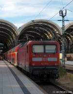 112 171-4 ist soeben am 18.7.10 mit dem RE aus Hamburg in den Kieler Hbf. eingefahren.