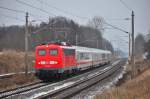 br-6115-db-fernverkehr/320300/mit-dem-ic-2239-ist-die Mit dem IC 2239 ist die frisch untersuchte 115 114 in Warnemünde gestartet.In Sildemow kurz hinter Rostock wurde der Zug abgepasst.Geknipst am 31.01.2014. 
