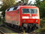 120 148-2 stand abgestellt in der Morgensonne im Bahnhof von Neumnster. 6.9.11