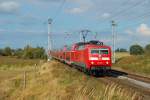 120 202 mit der RE 1 nach Hamburg Hbf rollt am 24.09.2009 durch Sildemow.