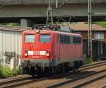 140 043-1 rumpelt hier gemtlich durch HH-Harburg. 01.06.11