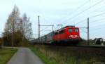 140 528-1 strebte am 25.10.13 mit einem Gterzug durch Dedensen-Gmmer.
