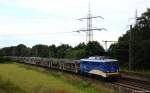 140 848-3 fuhr am Mittag des 1.7.14 mit einem leeren Autotransportzug bei Langwedel durch die Landschaft.