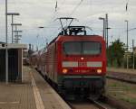 143 086-7 fuhr mit dem Regionalexpress nach Leipzig Hbf aus dem Bahnhof von Halle (Saale) am 23.7.11.
