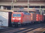 145 054-3 zog einen K-Line/Hanjin Containerzug durch Harburg. 26.2.11