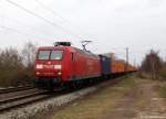 145 015-4 rollt am 31.3.11 mit einem Containerzug aus dem Hafen durch Moorburg und strebt weiter gen Harburg.
