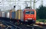 HH 24.
Hier kommt 145 047-7 mit ihrem  Prsentationszug (lt.Zugzielschild in der Lok)bestehend aus 45 Containerwaggons nach Hamburg Harburg gefahren. 19.09.09