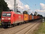 145 015-4 durchrollt am 4.9.10 mit einem bunten Containerzug den Ort Tostedt auf dem Weg gen Bremen.