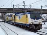 146 534-3 fhrt am 30.12.10 mit dem MEr nach Lneburg aus dem Bhf. Hamburg-Harburg von Gleis 4 ab.