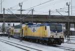 146 533-5 fhrt am 30.12.10 mit dem MEr nach Bremen Hbf. aus dem Bhf. Hamburg-Harburg ab.