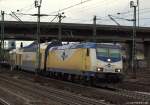 ME 146-08 fhrt am 8.1.11 mit dem ME nach Bremen Hbf. aus dem Bhf. Hamburg-Harburg von Gleis 3 ab.