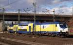 146 536-8 schiebt am 11.2.11 den MEr aus Lneburg in den Endbahnhof Hamburg-Harburg hinein.