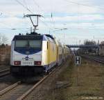 146 533-5 schiebt am 12.2.11 den MEr nach Hamburg Hbf. aus dem Tostedter Bhf. heraus.