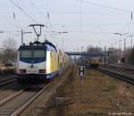 ME 146-06 schiebt am 12.3.11 den MEr nach Hamburg Hbf. aus dem Tostedter Bahnhof heraus.