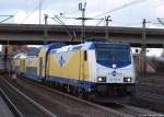 146 536-8 fhrt am 11.2.11 mit dem MEr nach Lneburg aus dem Bhf. Hamburg-Harburg ab.