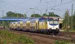 146 539-2 schiebt am 21.5.11 den MEr nach Hamburg Hbf. aus dem Bhf. Tostedt heraus.