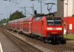 146 004-7 schiebt am 4.6.11 den RE 1 nach Aachen Hbf. aus dem Bhf. Kamen heraus.