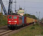 151 071-8 fhrt am 25.9.10 mit einem bunten Containerzug durch den Ort Tostedt.