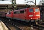 151 104-7 und 166-6 mit einem Kohletransport in Richtung Hafen. 2.4.11