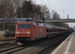 Mit einem Gz rollt 152 023-8 am 12.3.11 durch den Bhf. Tostedt.