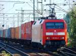 HH 19.
DB Cargo 152 012-1 mit einem langen Containerzug kurz vor HH-Harburg. 19.09.09