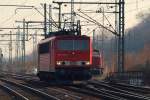 155 039-1 noch mit Scherenstromabnehmern brummte elegant an uns vorbei. HH-Harburg 26.2.11