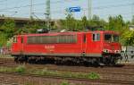 155 028-4 fuhr einsam aber mit hohem Tempo durch HH-Harburg. 7.5.11