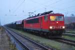 Am dunklen und trben 12.11.2009 konnte die 155 103 mit dem CS 61035 nach Poppendorf im Rbf Rostock-Seehafen geknipst werden.