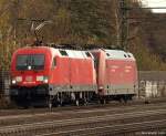 182 005-9 schleppt am 6.11.10 die 101 032-1 durch den Harburger Bahnhof gen Norden.